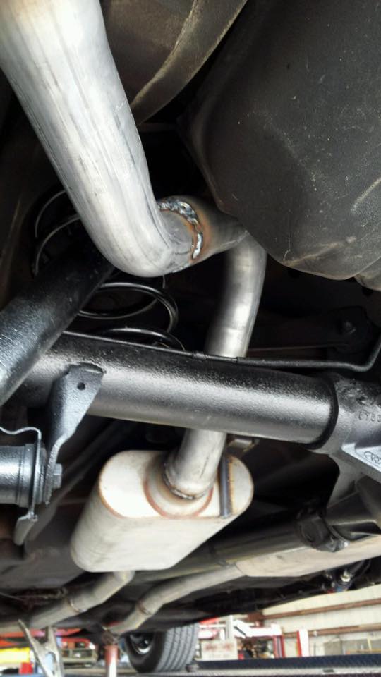 Exhaust work under vehicle