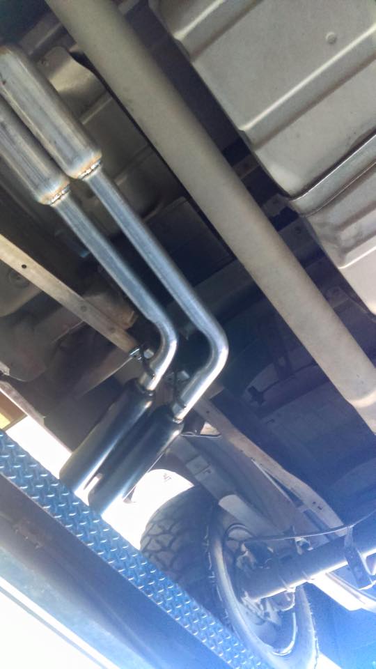 Exhaust pipes and mufflers installed